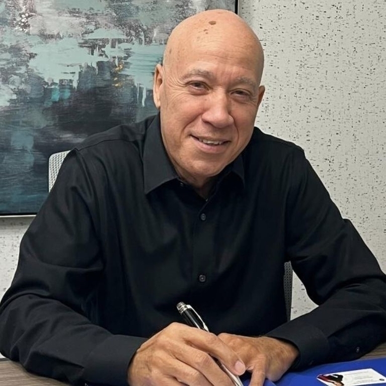 Victor Toribio Logo